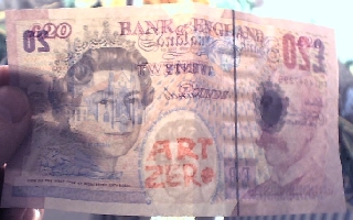 Marking the currency with Art Zero rubberstamps
