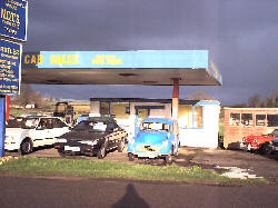 Cars on a village forecourt
