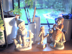 Cheap ceramic sex drama on windowsill